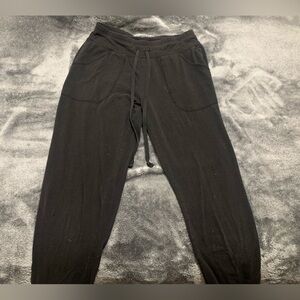 Black drawstring sweatpants in size extra small